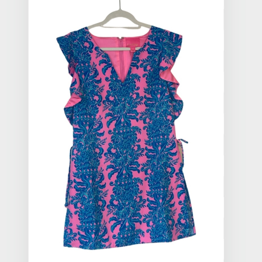 Lilly dress with shorts underneath. Ruffle short sleeve. Adorable!
